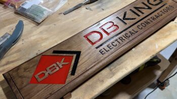 CNC sign on walnut