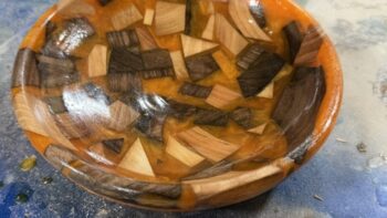 Epoxy resin bowl with pieces of cherry and walnut